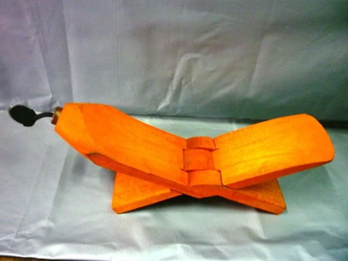 Wooden household item with unique design shared by 100 people showcasing rare items from their country.