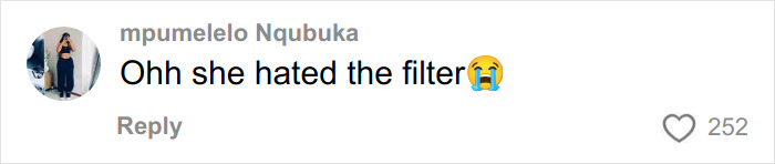 Comment from South African fan reacting to Dua Lipa using a filter on their selfie together with crying emoji.