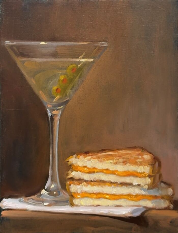 Martini with olives next to a classical art style grilled cheese sandwich painting of modern-day fast food.