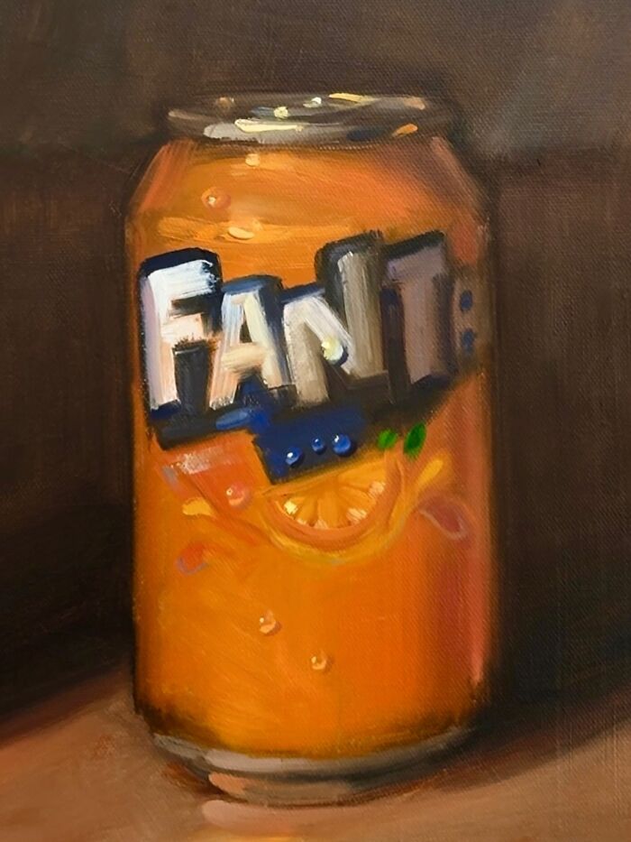 Oil painting of a modern-day fast food Fanta can portrayed through a classical art style by an artist.