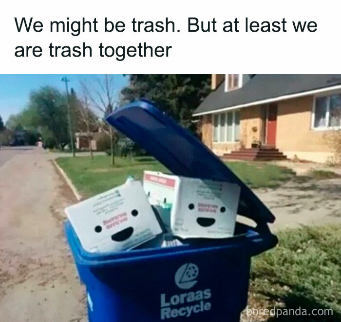 Two smiling trash bins outdoors with caption about being trash together, relatable meme about introvert life humor.