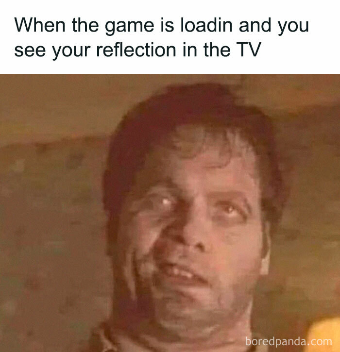 Man making a confused face with caption about seeing reflection on TV loading screen, relatable introvert meme.