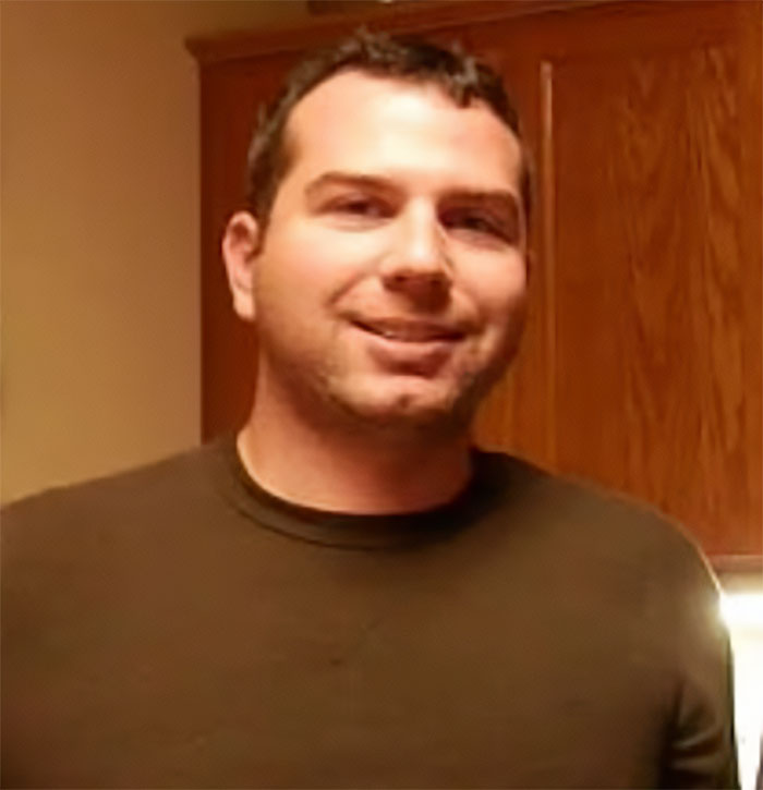 Minneapolis ICE agent smiling indoors, breaking silence after crowdfunding support in a casual setting. Minneapolis ICE agent smiling indoors, breaking silence after crowdfunding support in a casual setting.