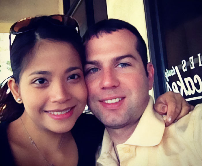 Couple smiling closely together in a casual setting, related to father of ICE agent amid immigrant wife news. Couple smiling closely together in a casual setting, related to father of ICE agent amid immigrant wife news.