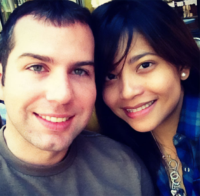 A smiling couple posing closely together, representing the father of ICE agent amid immigrant wife bombshell story.