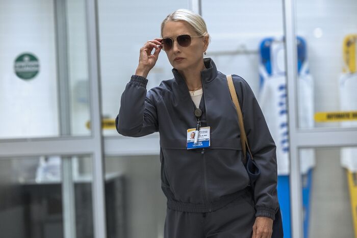 Katherine LaNasa portraying Nurse Dana, inspired by her cancer diagnosis, wearing dark medical scrubs and sunglasses. Katherine LaNasa portraying Nurse Dana, inspired by her cancer diagnosis, wearing dark medical scrubs and sunglasses.