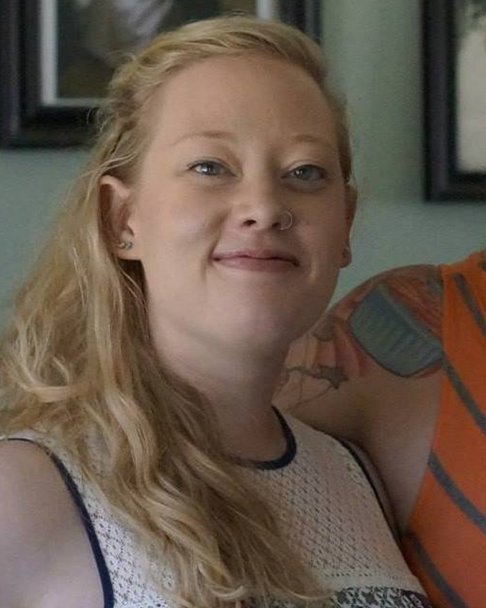 Young woman with long blonde hair and nose ring smiling indoors, linked to Kyle Rittenhouse and ICE slaying Minneapolis discussion. Young woman with long blonde hair and nose ring smiling indoors, linked to Kyle Rittenhouse and ICE slaying Minneapolis discussion.