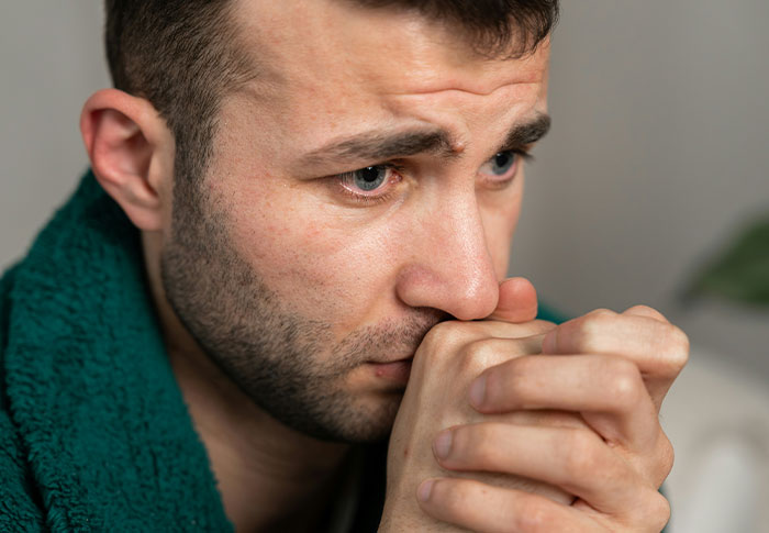 Man in apartment looking worried and anxious, noticing strange things and uncovering a creepy unsettling truth. Man in apartment looking worried and anxious, noticing strange things and uncovering a creepy unsettling truth.