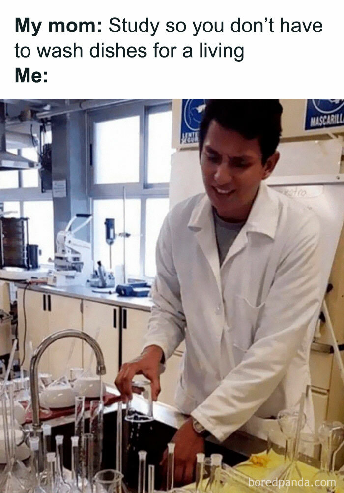 Young man in lab coat struggling with washing dishes in a lab, highlighting humor in expensive healthcare memes.