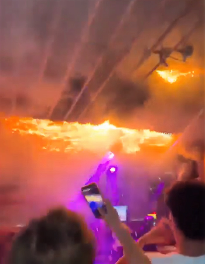 Blazing fire at a packed Swiss ski bar with people inside capturing the deadly blaze on their phones. Blazing fire at a packed Swiss ski bar with people inside capturing the deadly blaze on their phones.