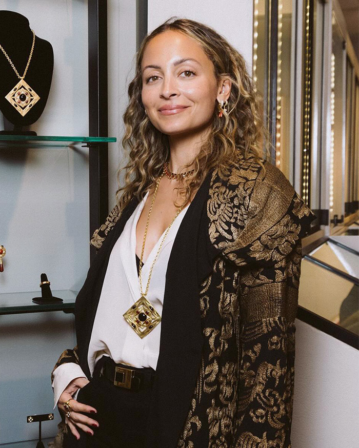 Nicole Richie wearing a patterned jacket and gold necklace, revealing her 18‑year‑old daughter now goes by a new name.