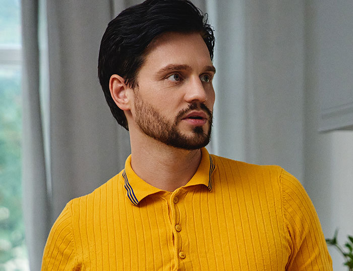 Man in yellow shirt looking concerned, representing a guy demanding paternity test for his 3-year-old son. Man in yellow shirt looking concerned, representing a guy demanding paternity test for his 3-year-old son.