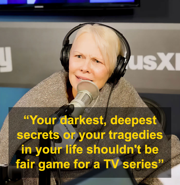 Pamela Anderson wearing headphones and speaking on a podcast after a yucky experience with Seth Rogen at Golden Globes.