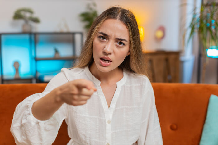 Woman furious pointing and confronting family in living room about her 2YO daughter being mocked Woman furious pointing and confronting family in living room about her 2YO daughter being mocked