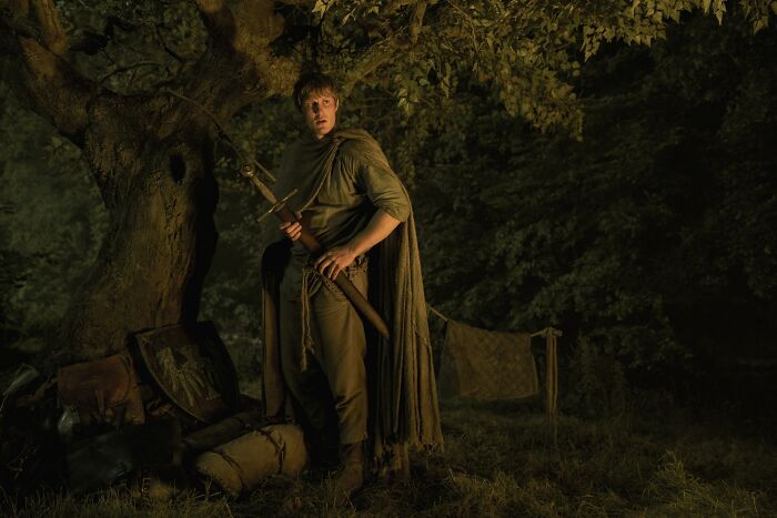 Character Ser Duncan the Tall in medieval clothing holding a sword outdoors, linked to major Game of Thrones theory.