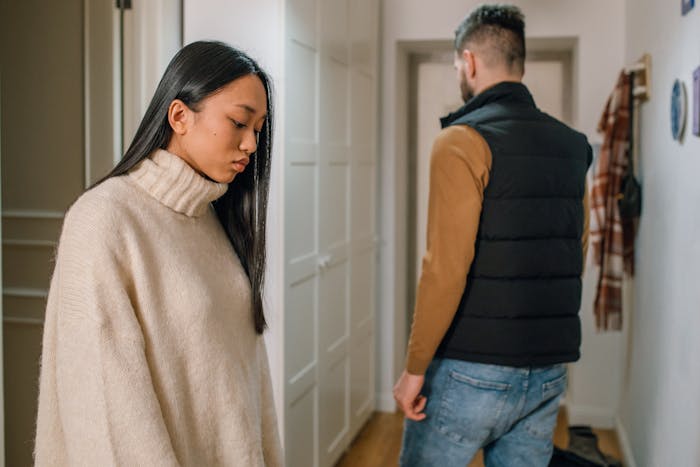 Dad feeling guilty and distancing himself from daughter during messy divorce in a tense and emotional home setting