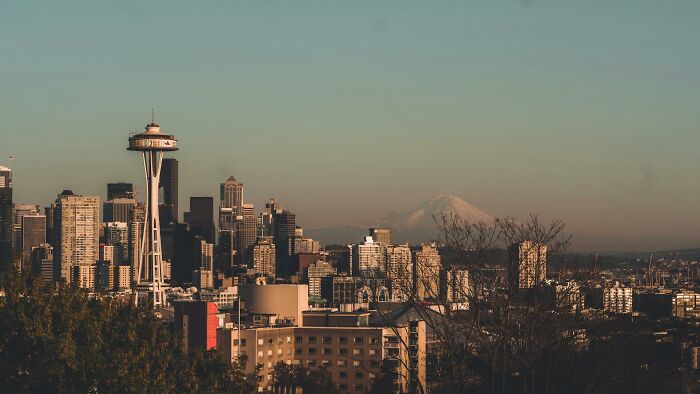 Seattle city skyline with Space Needle and Mount Rainier in the background, highlighting lesser-known facts about these countries.