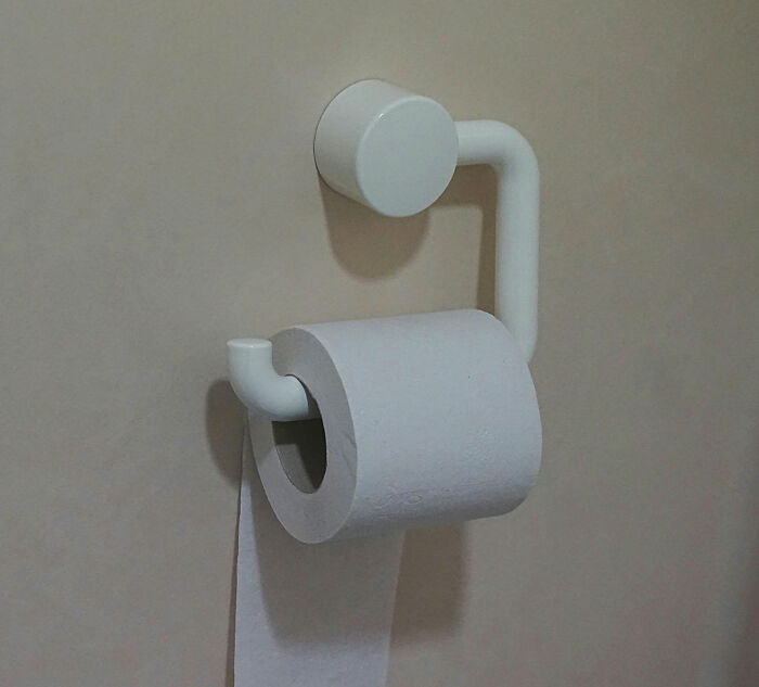 Toilet paper roll installed backwards, illustrating petty couples fights during the Christmas period over small issues.