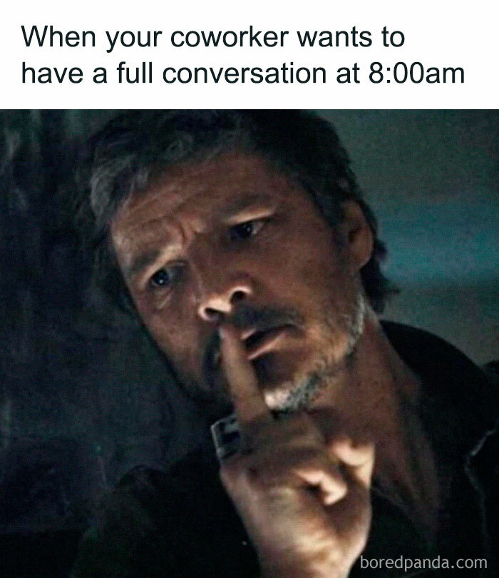 Man with beard holding finger to lips signaling silence, representing funny memes that make absolutely no sense and somehow work.