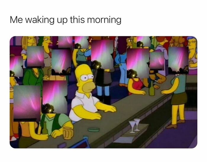 Homer Simpson sitting at a bar surrounded by edited faces, a funny meme illustrating confusion or tiredness.