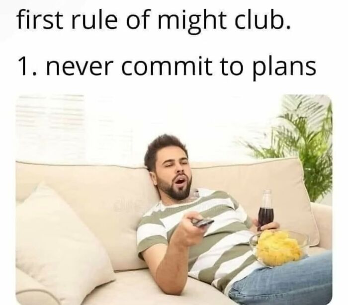 Man lounging on couch with snacks and soda, illustrating a funny meme about never committing to plans, humor concept.