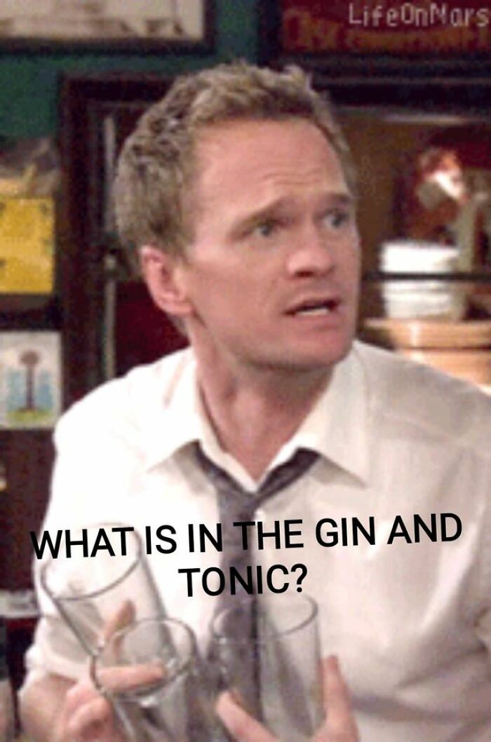 Man in white shirt and loosened tie holding several empty glasses, relatable restaurant workers meme about gin and tonic drink.