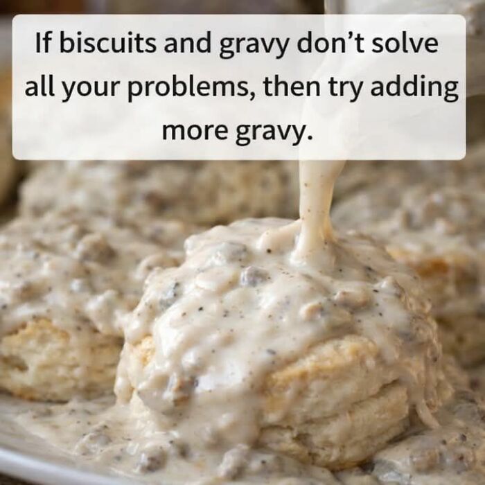 Close-up of biscuits being covered with creamy sausage gravy, a relatable moment for restaurant workers and food service memes.