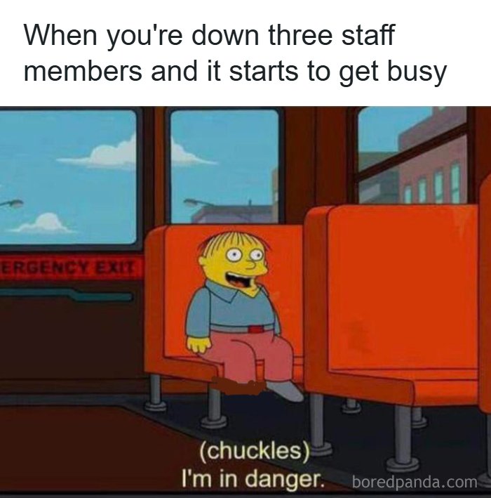 Cartoon character on a bus with caption about being down staff and feeling danger, relatable to restaurant workers memes.