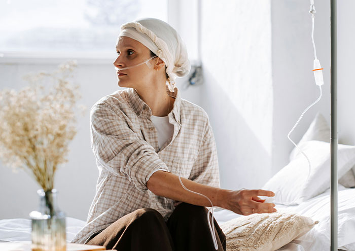 Patient receiving intravenous treatment at home, reflecting on anonymous secrets too explosive people to expose.