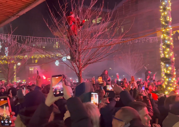 Crowd capturing video with phones at a ski resort explosion site as survivors reveal cause of the deadly incident. Crowd capturing video with phones at a ski resort explosion site as survivors reveal cause of the deadly incident.