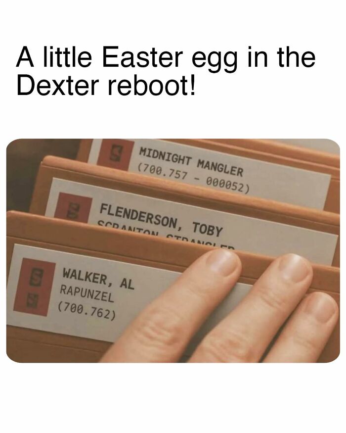 Close-up of a hand flipping through files with names referencing memes inspired by the TV series The Office.