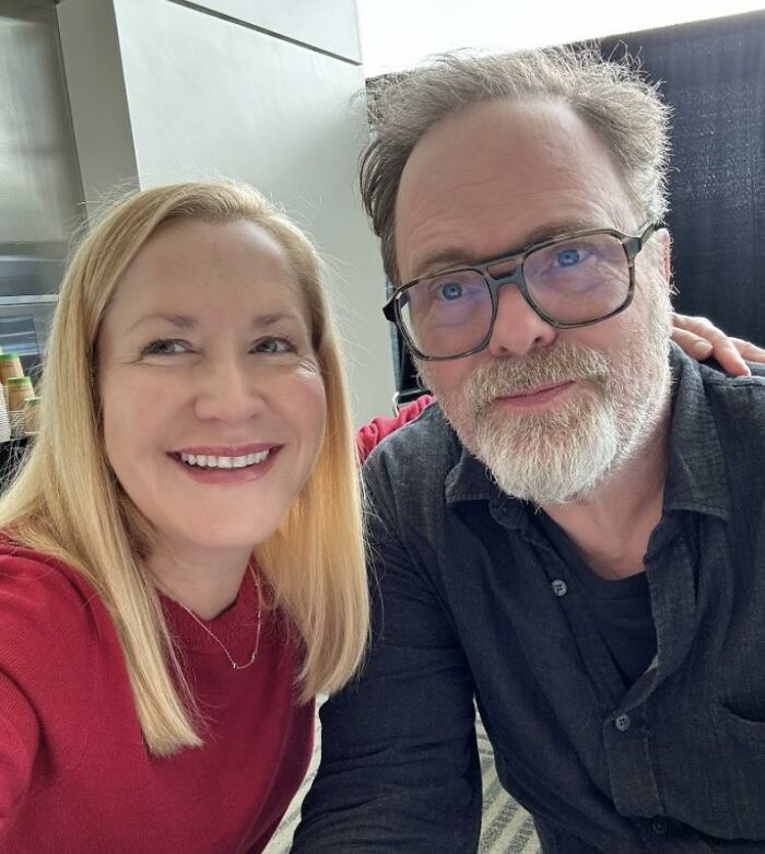 Cast members from the TV series The Office smiling together in a casual indoor setting for a meme-inspired photo.