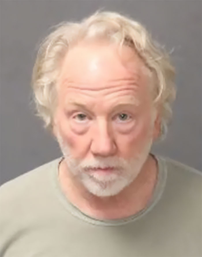 Timothy Busfield mugshot showing him with light hair and beard amid huge twist in case with accusers denying claims.