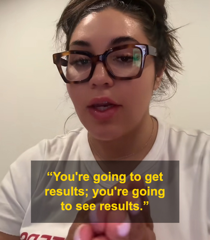 Young woman wearing glasses explaining results of BBLs and breast implants using donated lifeless bodies in a video message.