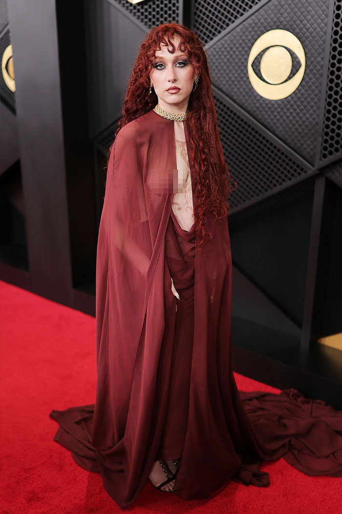 Chappell Roan on the Grammys red carpet wearing a sheer maroon outfit sparking online outrage and controversy.