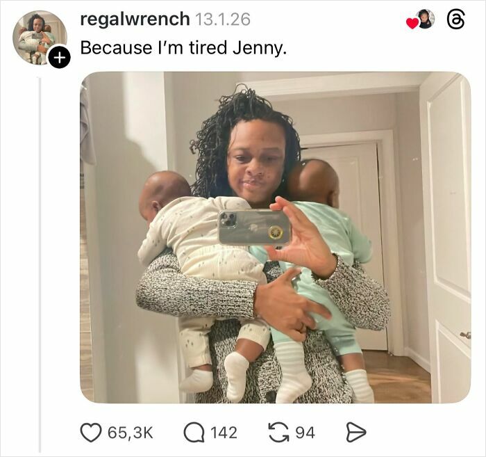 Woman holding two babies, taking a mirror selfie, illustrating tiredness as a reason for not getting nails done.