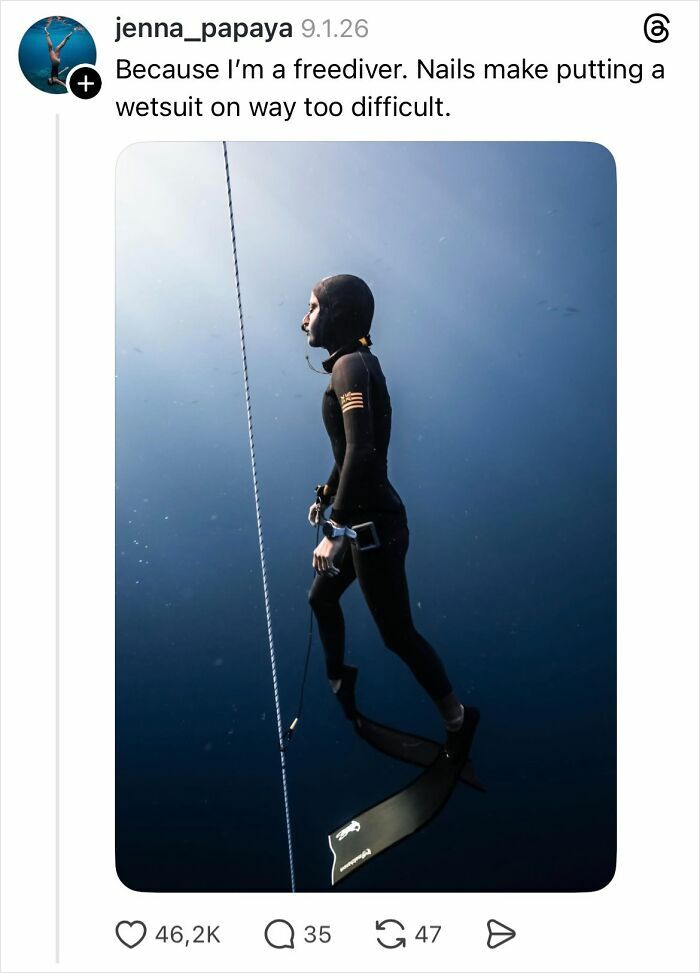 Freediver in wetsuit explains why girls don’t get their nails done with funny and savage replies about nails and diving.