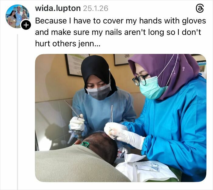 Two women in protective clothing and masks performing a medical procedure, highlighting why girls don't get their nails done.