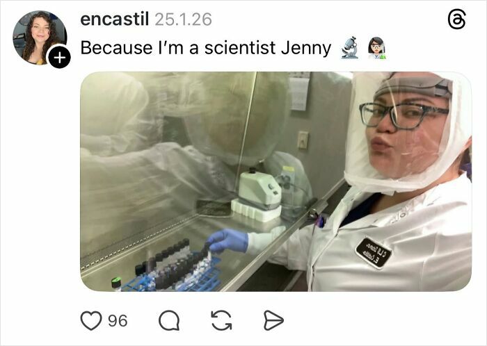 Woman scientist in protective gear working in a lab, illustrating why some girls don’t get their nails done.