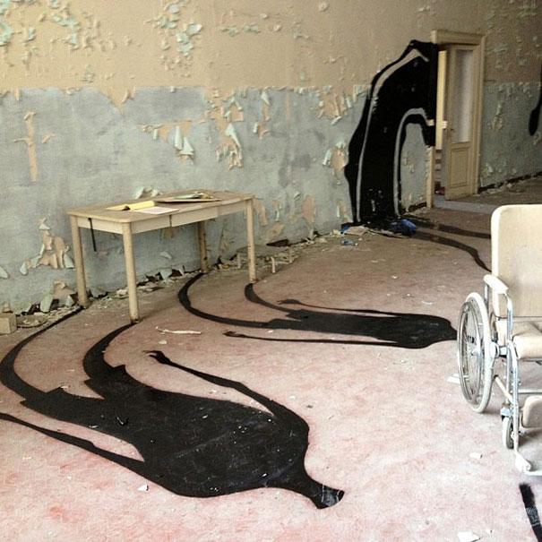 Street Artist Paints Ghostly Shadows in Abandoned Psychiatric Hospital