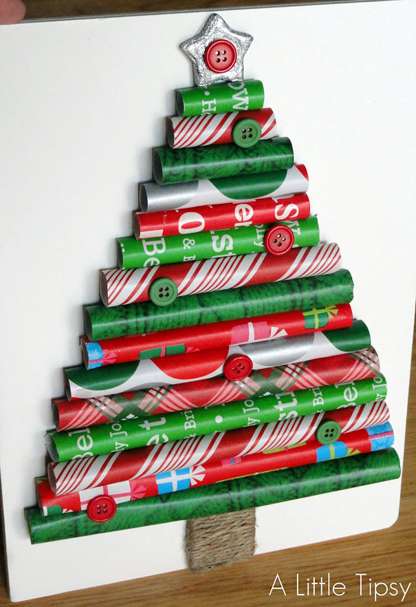 Creative DIY Christmas tree made of rolled wrapping paper and buttons on a white background. Creative DIY Christmas tree made of rolled wrapping paper and buttons on a white background.