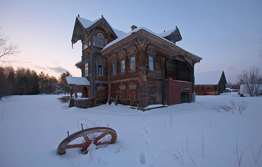 Abandoned wooden house in winter Abandoned wooden house in winter
