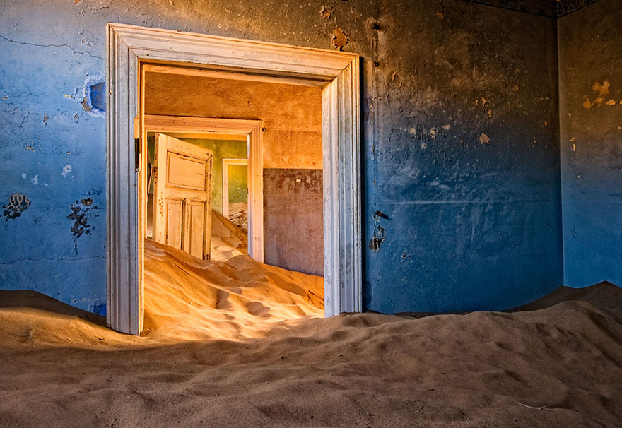 Creepy blue Rooms filled with sand 