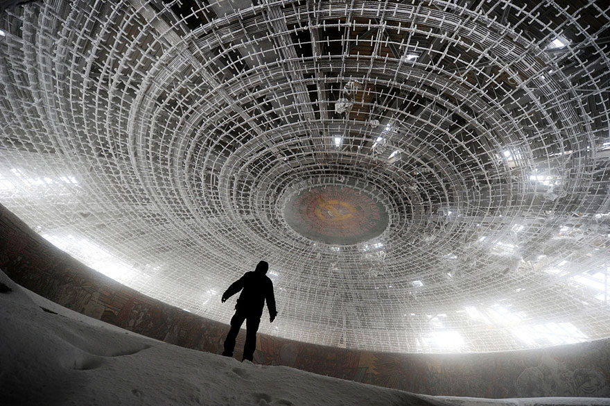 Man standing inside an abandoned building 