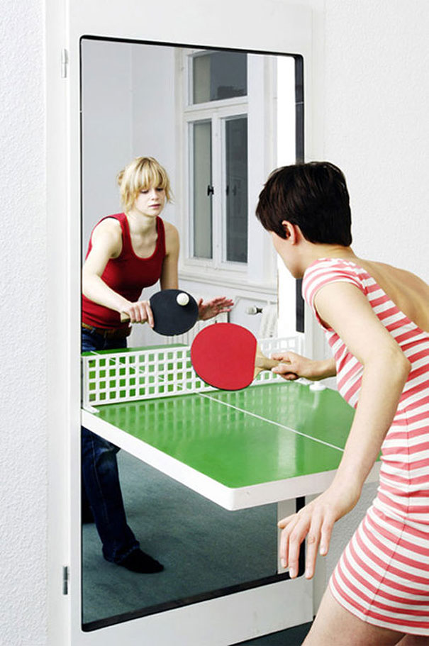 Innovative interior design idea featuring a wall-mounted ping pong table creating a fun and awesome house space. Innovative interior design idea featuring a wall-mounted ping pong table creating a fun and awesome house space.