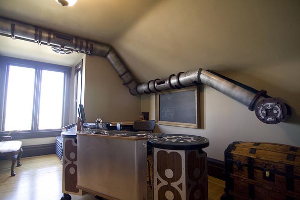 Steampunk-inspired room design with industrial pipes, vintage desk, and natural light creating an awesome house space. Steampunk-inspired room design with industrial pipes, vintage desk, and natural light creating an awesome house space.