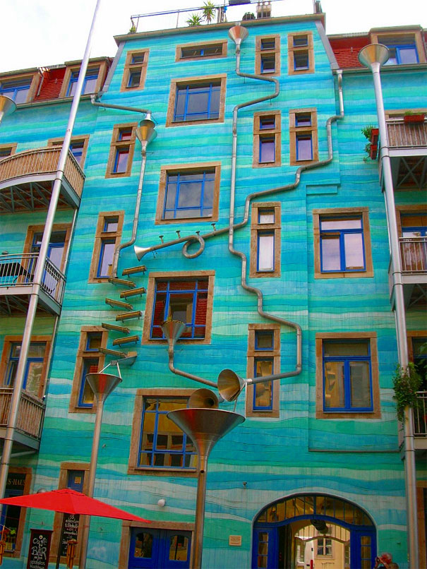 Colorful house facade with unique metal tubing and artistic design ideas making the house look creative and awesome. Colorful house facade with unique metal tubing and artistic design ideas making the house look creative and awesome.