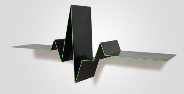 Creative bookshelf design with a black zigzag pattern and green edges on a white background. Creative bookshelf design with a black zigzag pattern and green edges on a white background.