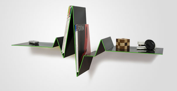 Creative bookshelf design resembling a zigzag pattern, holding books and small decor items.