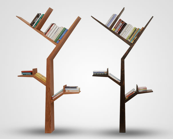Creative bookshelf designs resembling tree branches with books displayed on wooden shelves.